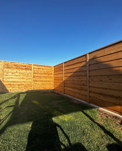 7ft horizontal board-on-board cedar fence installed by Hudson Fence Company